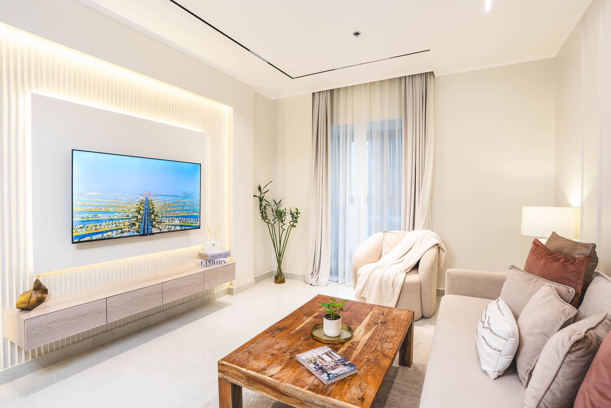 Living room with a backlit TV wall