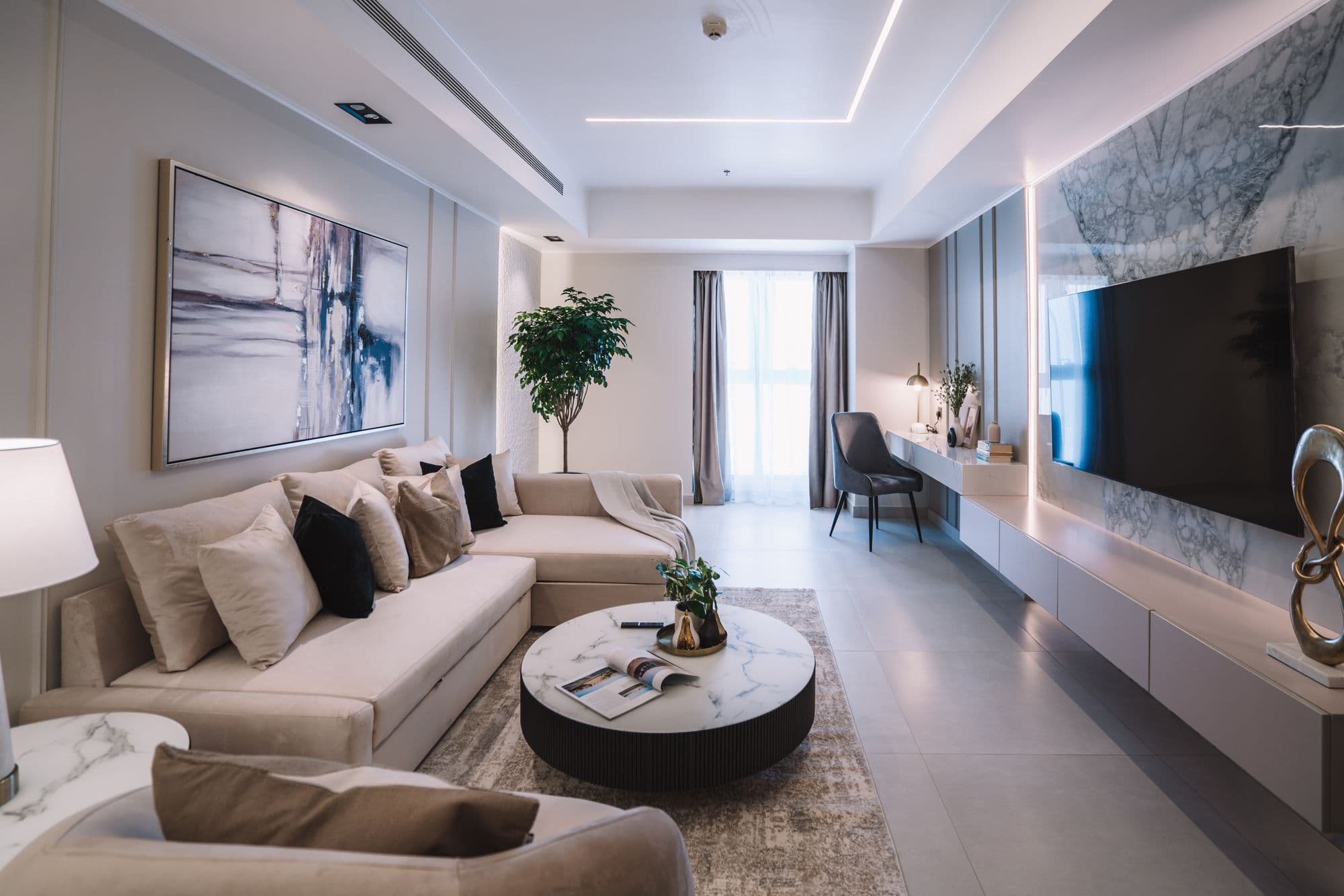 Living room with a marble feature wall