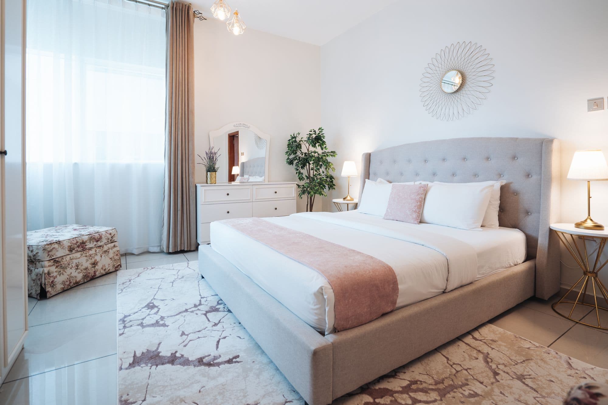 Bedroom with soft pink accents